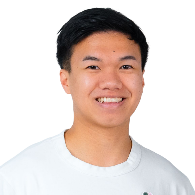Smiling young man in light gray shirt